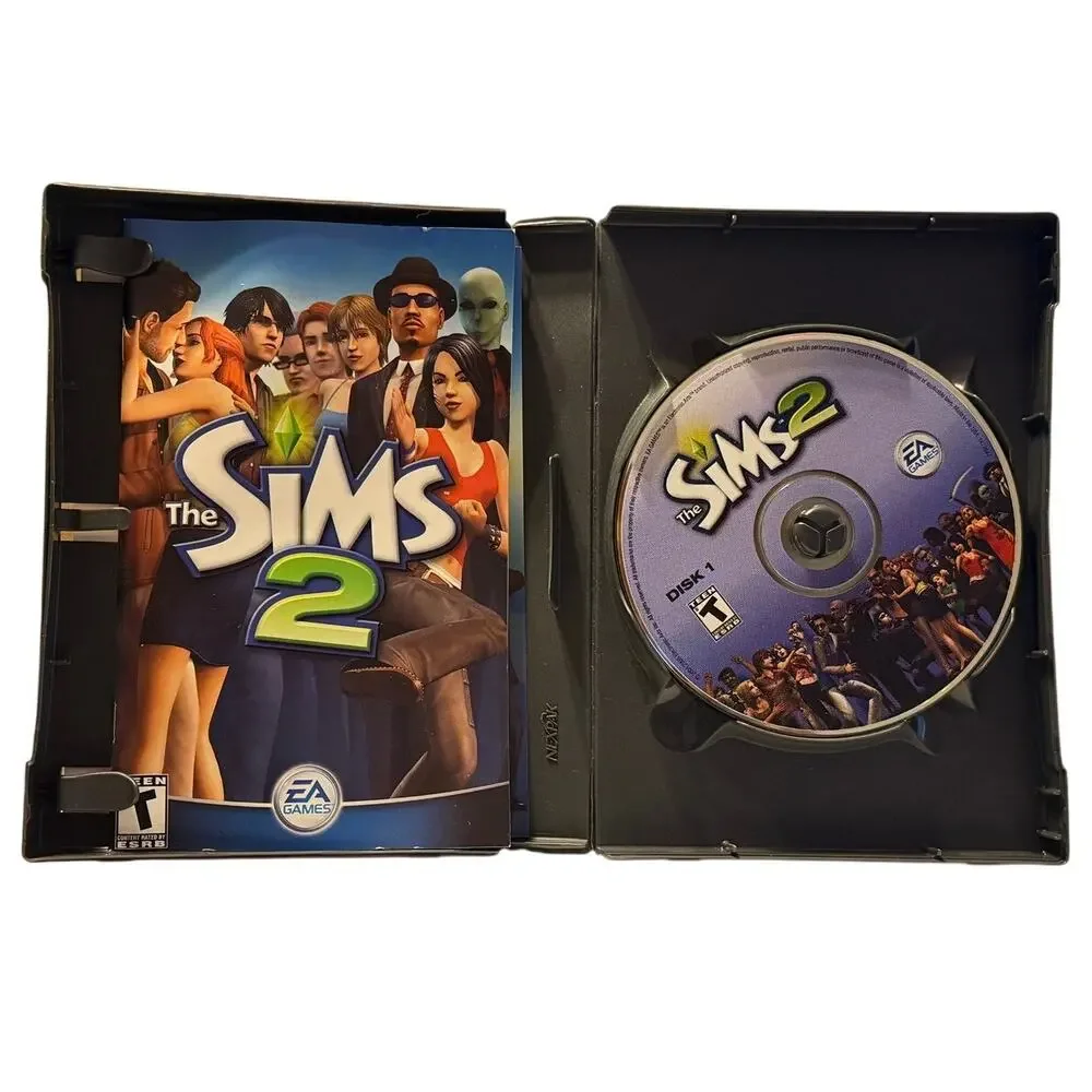 The Sims 2 PC Windows CD-ROM EA 2005 4-Disc Set w/ Manual Preowned